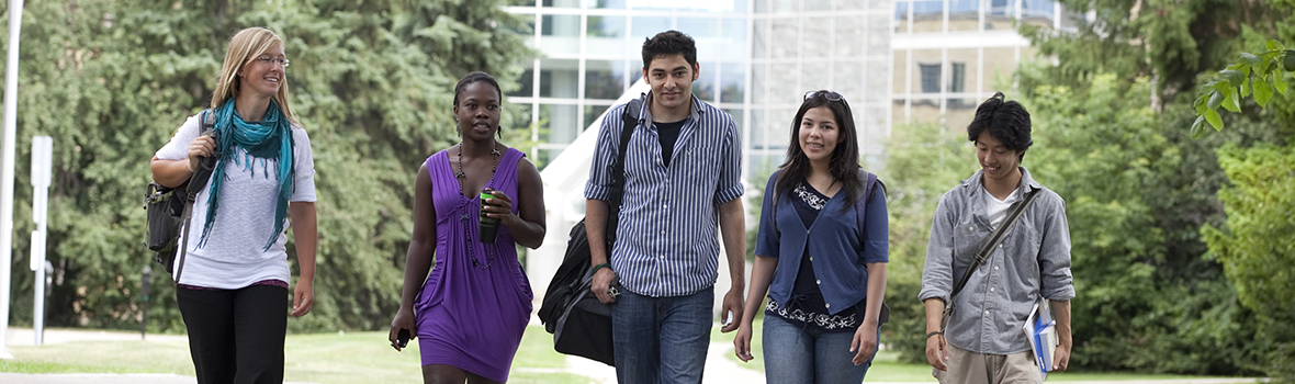 Students sitting on lawn
